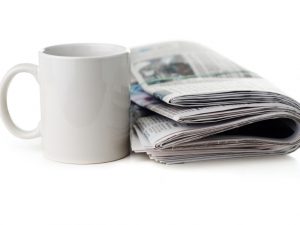 Newspaper and a Coffee Cup