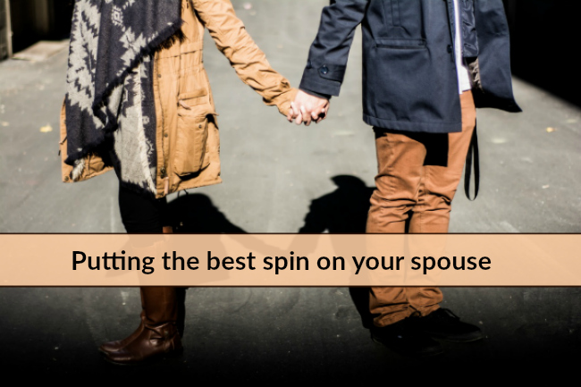 couple holding hands spin on spouse